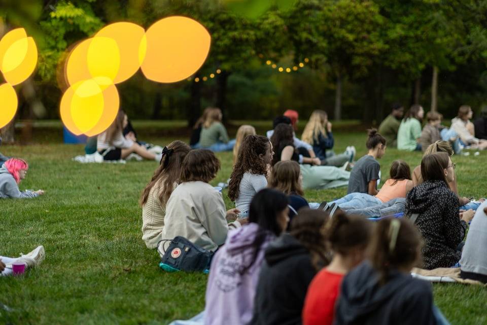 people outside listening to music
